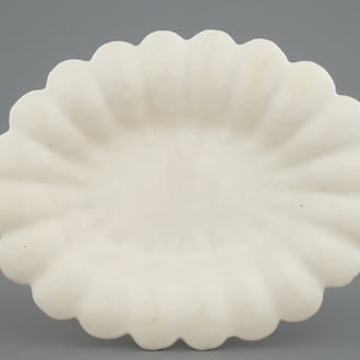 A rare white Delft oval gadrooned dish, 17th C.