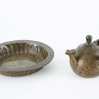 An islamic brass basin and a bronze water pot, Northern Africa, 17/19th C.