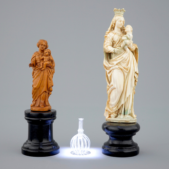 Two figures of Mary with child in ivory and boxwood, with a miniature glass bottle, 16/17th C.