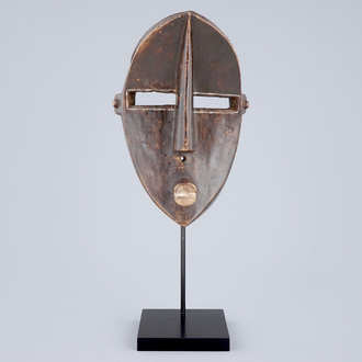 An African carved wooden mask, Lwalwa, Congo, early 20th C.