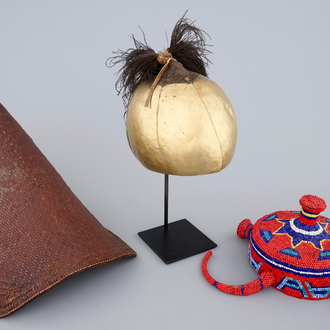 Two African hats and a Sudanese helmet, mid 20th C.