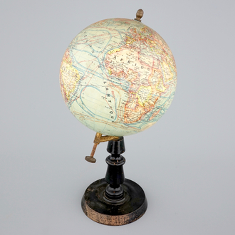 A globe on wood stand, edited by Forest in Paris, ca. 1925