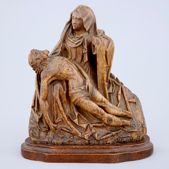 A carved wood fragment of a retable depciting a Pietà, prob. Flemish, 16th C.