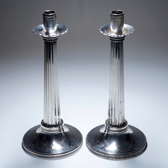 Two silver candle sticks, empire, France, 19th C.