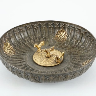 A flared gilt silver hamam bowl with 3 birds on a central medallion, 17/18th C.