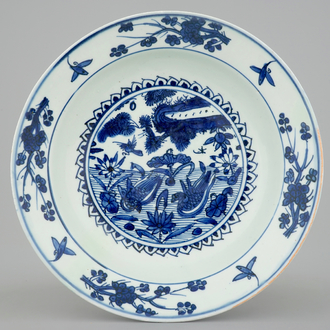 A blue and white Chinese ducks and lotus pond dish, Ming Dynasty