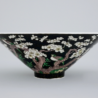 An unusual conical Chinese famille noire bowl, 19th C.