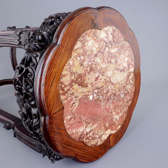 A tall Chinese carved wood stand with marble inset, 19th C.