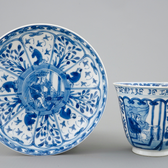 A rare Chinese blue and white Kangxi cup and saucer with French text, Kangxi