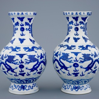 A pair of blue and white dragon vases with Wanli mark, 19th C.