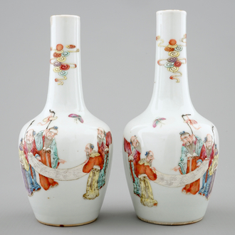 A pair of Chinese famille rose bottle vases, 19th C.