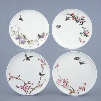 A set of four Chinese famille rose plates with birds and flowers, 20th C.