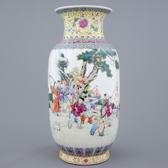 A Chinese famille rose vase with a parade of boys, 20th C.