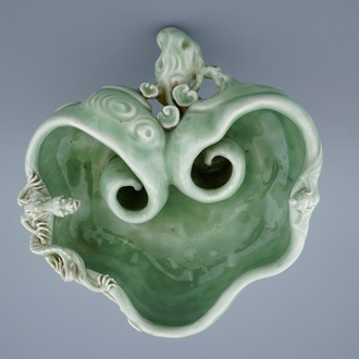 A Chinese monochrome celadon glazed brushwasher formed as a lingzhi fungus, 19th C.