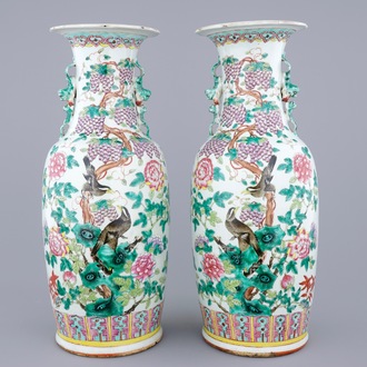 A fine pair of tall Chinese famille rose vases with birds, grapes and flowers, 19th C.