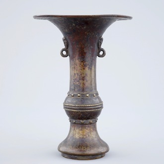 A marked Chinese bronze gu vase with traces of gilt lacquer, late Ming Dynasty