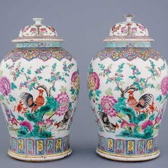 A pair of Chinese famille rose baluster jars and covers with roosters, 19th C.