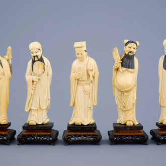 A set of 5 Chinese carved ivory figures of immortals on wooden bases, 19th C.