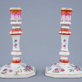 A pair of Chinese famille rose candlesticks, Qianlong, 18th C.