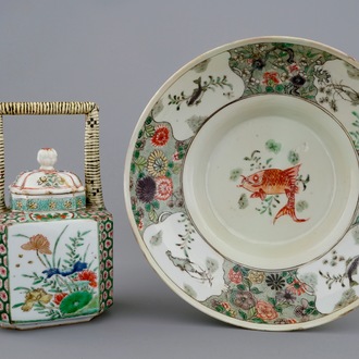 A Chinese famille verte teapot and a plate with fish, Kangxi