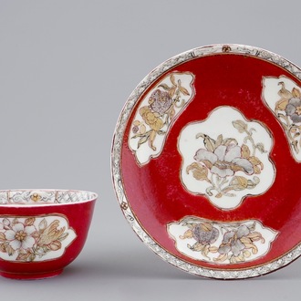 A Chinese eggshell ruby ground cup and saucer, Yongzheng, 1723-1735