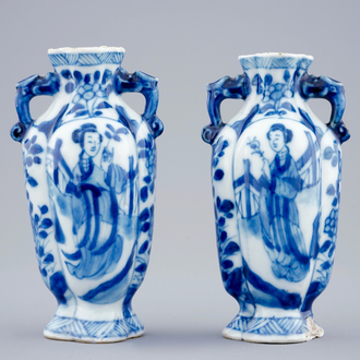 A pair of small Chinese blue and white vases with long Elizas, Kangxi