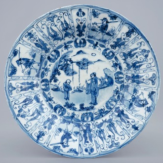 A Chinese blue and white plate with figures in a landscape, Ming Dynasty, mid-17th C.