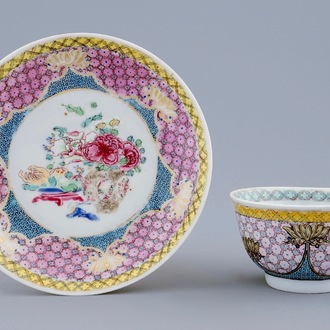 Een Chinese famille rose eierschaal kop en schotel met een bloemvaas, Yongzheng, 1723-1735