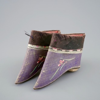 A pair of Chinese embroidered lotus shoes, 19/20th C.