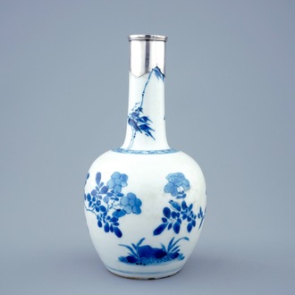 A Chinese blue and white bottle shaped vase with silver mount, Kangxi