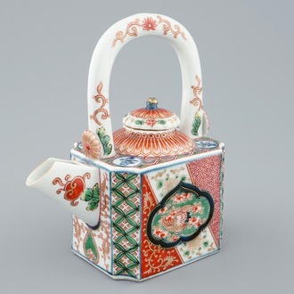 A Japanese Imari arch-handled teapot and cover, 18th C.