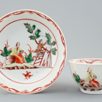 A Chinese European subject cup and saucer with cherry pickers, Qianlong, 18th C.