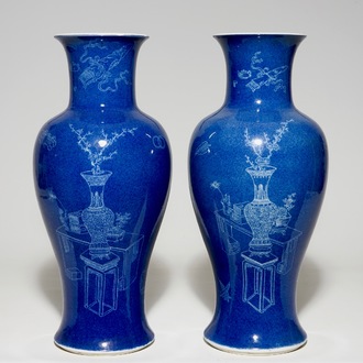 A pair of Chinese powder blue ground vases with incised decoration, 19th C.