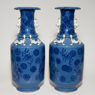 A pair of tall Chinese lavender blue ground vases with auspicious symbols, 19th C.