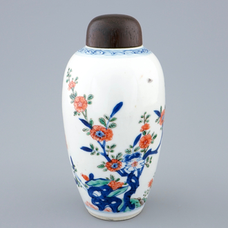 A Chinese famille verte vase with wooden cover, Kangxi