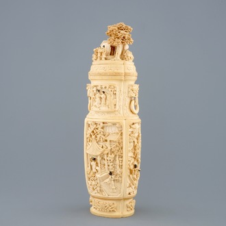 A very fine Chinese carved ivory vase and cover with figures in a landscape, ca. 1900