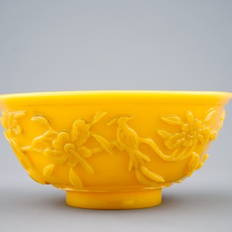 A Chinese carved yellow Beijing glass bowl, 19th C.