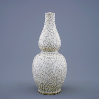 A Chinese monochrome crackle glazed double gourd vase, 19th C.