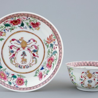 A Chinese famille rose armorial cup and saucer for the Dutch market, Yongzheng/Qianlong