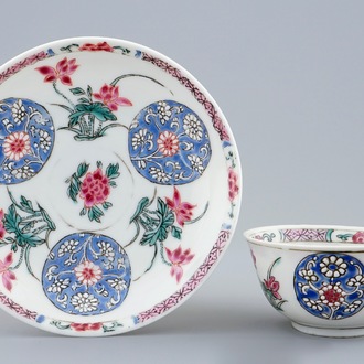 A Chinese famille rose semi-eggshell cup and saucer with floral design, Yongzheng/Qianlong