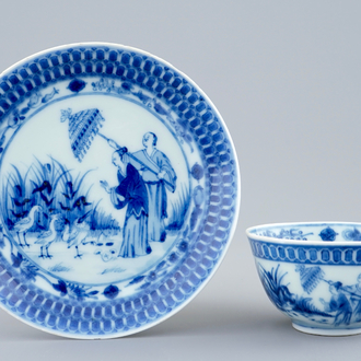 A Chinese blue and white cup and saucer with "La Dame au Parasol" after Pronk, ca. 1740