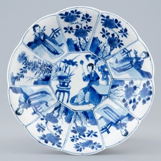 A Chinese blue and white moulded plate with long Eliza, Kangxi