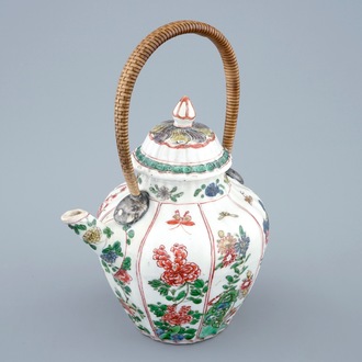 A Chinese famille verte teapot and cover with replacement handle, Kangxi