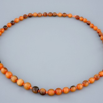 A Chinese rhino horn beads necklace, 19th C.