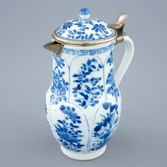 A Chinese blue and white jug and cover, Kangxi