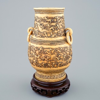 A Chinese carved ivory hu vase on wooden stand, 19th C.