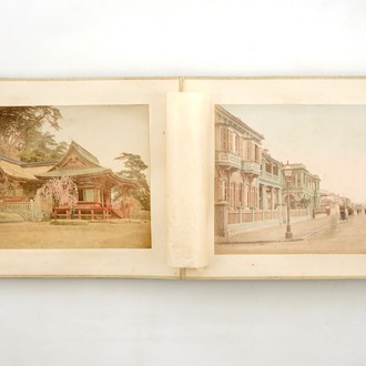 A Japanese photo album with 50 polychrome albumine photos, in original box, 19th C.