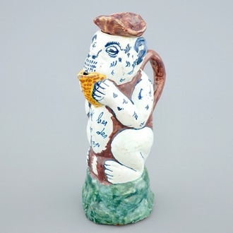 A polychrome Dutch Delft monkey-shaped jug, 19th C.