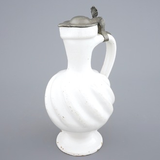 A white Dutch Delft pewter-mounted gadrooned jug, 17/18th C.