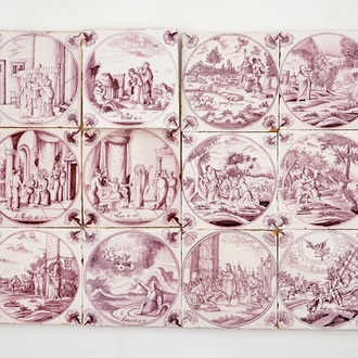 A set of 12 manganese Dutch Delft biblical tiles with carnation corners, 18th C.